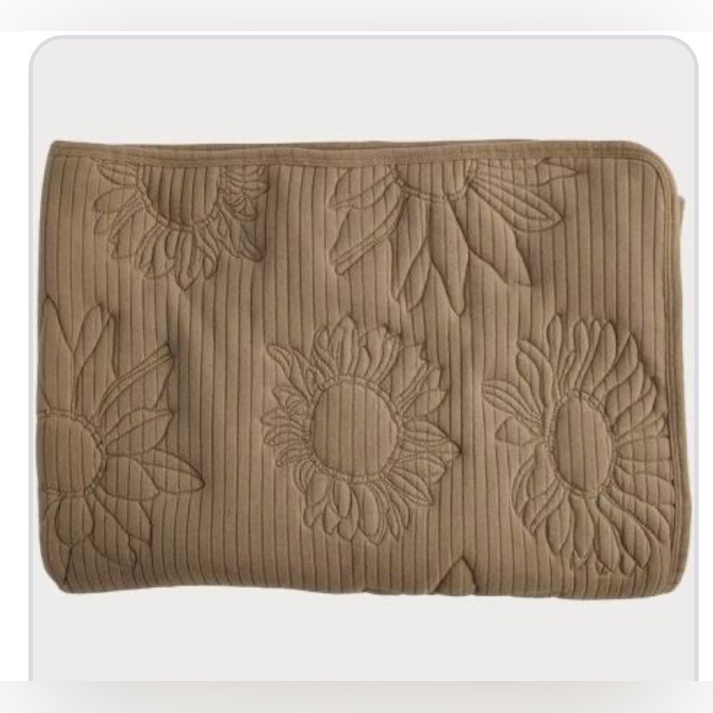 Kate Quinn Embroidered sunflower quilt